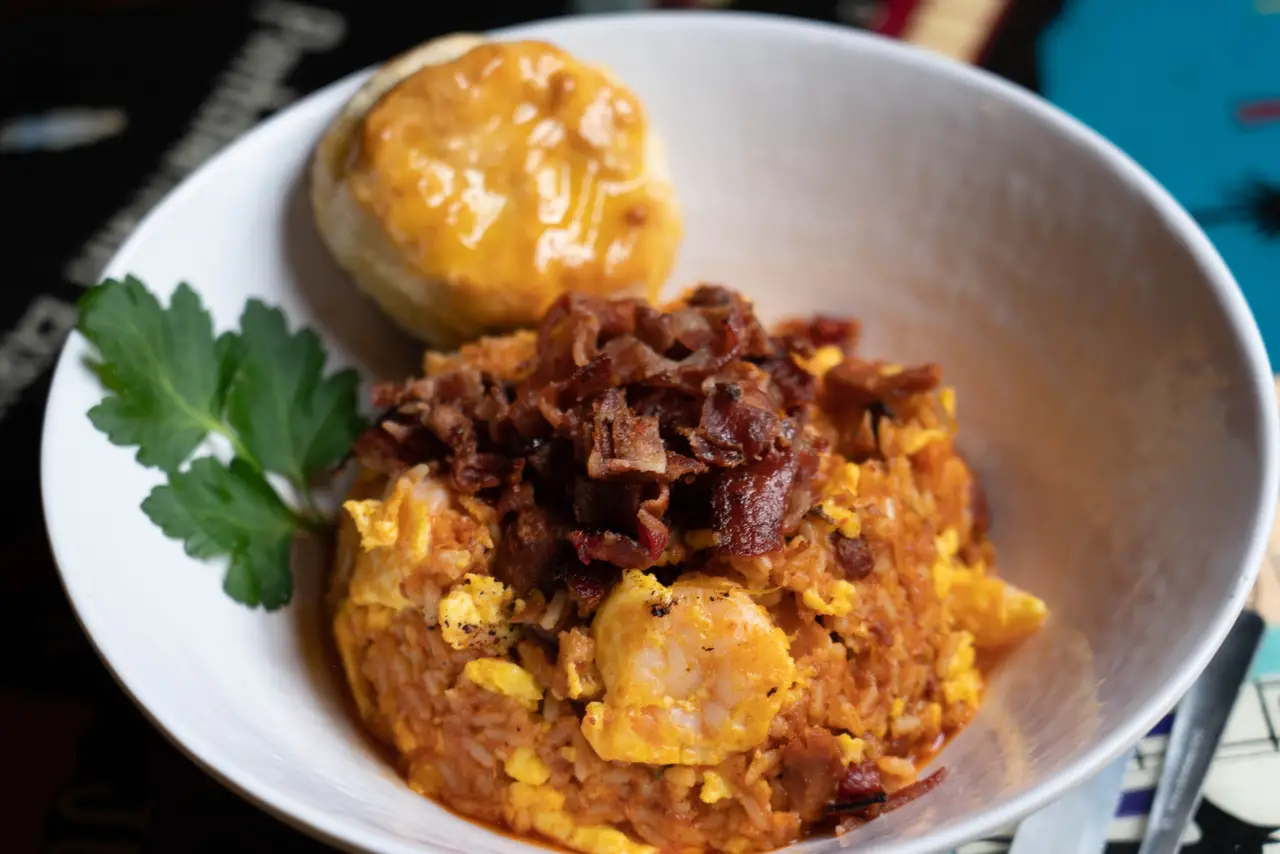 Maw Maw’s Cajun Breakfast: eggs scrambled with bacon, ham and shrimp, with hash browns and a biscuit